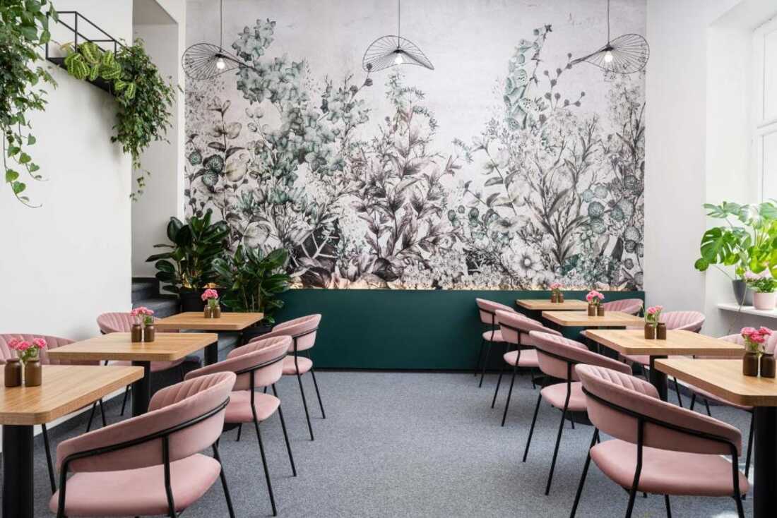 Breakfast room with botanical mural at Hotel Botanica Brno